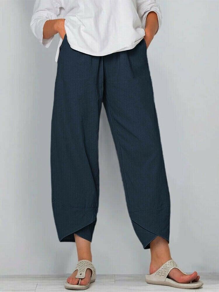 Pantalon vintage à taille élastique et poches asymétriques