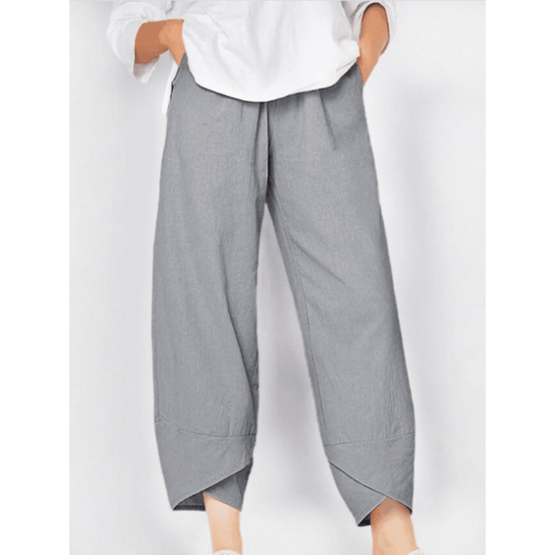 Pantalon vintage à taille élastique et poches asymétriques