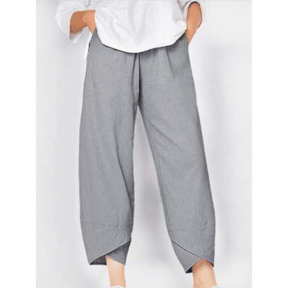 Pantalon vintage à taille élastique et poches asymétriques
