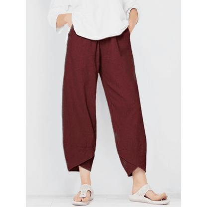Pantalon vintage à taille élastique et poches asymétriques