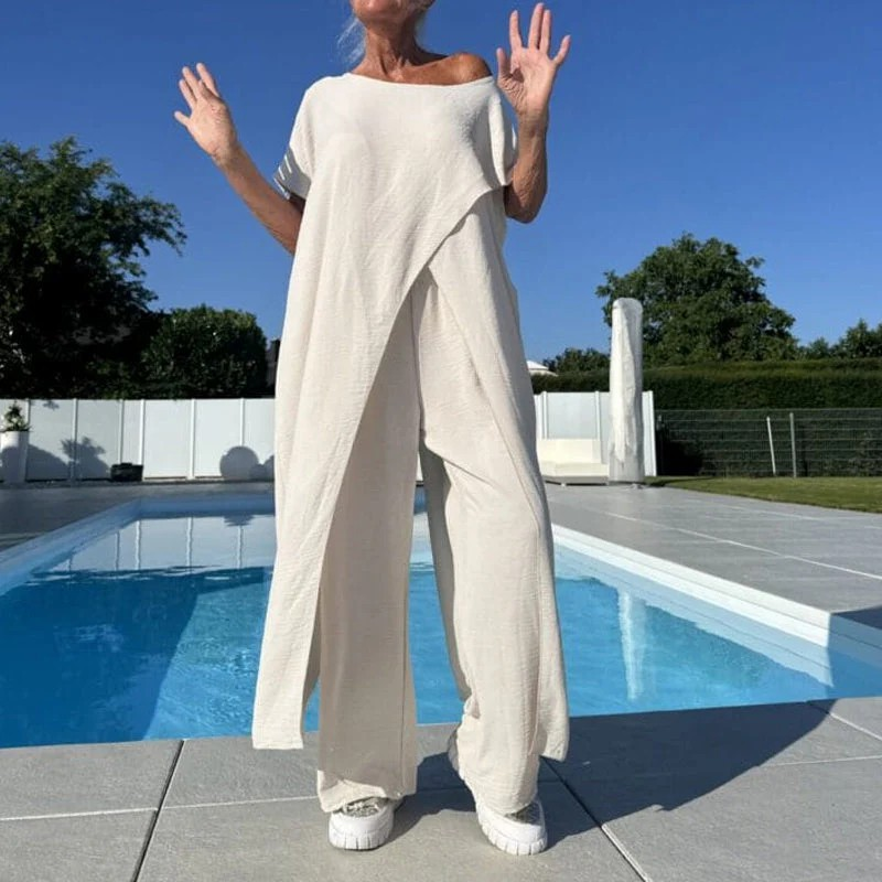 Ensemble femme composé d'un haut asymétrique à épaules dénudées et d'un pantalon