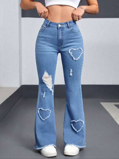 Jean taille haute vintage à patchwork cœur et effet destroy
