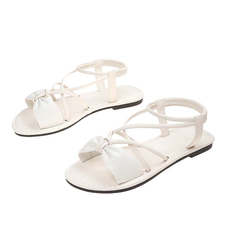 👡 50% DE RÉDUCTION ✨ Sandales plates pour femme à brides croisées – Légères, élégantes & parfaites pour l'été – maintien ajusté sans effort 🌊