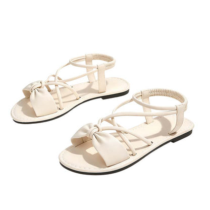 👡 50% DE RÉDUCTION ✨ Sandales plates pour femme à brides croisées – Légères, élégantes & parfaites pour l'été – maintien ajusté sans effort 🌊