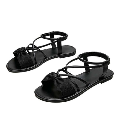 👡 50% DE RÉDUCTION ✨ Sandales plates pour femme à brides croisées – Légères, élégantes & parfaites pour l'été – maintien ajusté sans effort 🌊