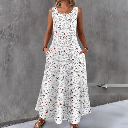 👗 Robe longue à fleurs sans manches pour femme — poches latérales, élégante et confortable 🌸