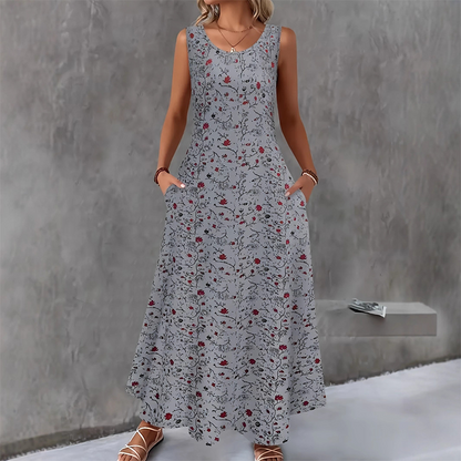 👗 Robe longue à fleurs sans manches pour femme — poches latérales, élégante et confortable 🌸