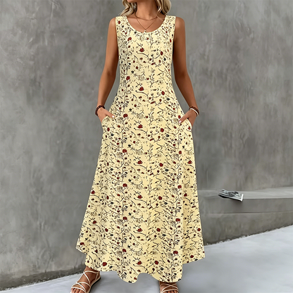 👗 Robe longue à fleurs sans manches pour femme — poches latérales, élégante et confortable 🌸
