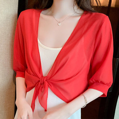📢50 % DE RÉDUCTION⏰Top/Blouse Femme en Chiffon Transparent à Nœud Devant – Coupe Courte, Décolleté en V, Style Romantique & Élégant, Parfait pour Superposition🍷