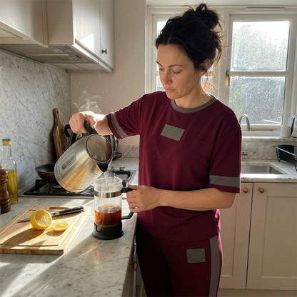 Ensemble de détente deux pièces pour femme avec détails à rayures