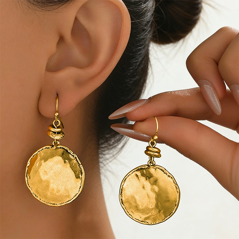 Boucles d'oreilles pendantes vintage en métal martelé