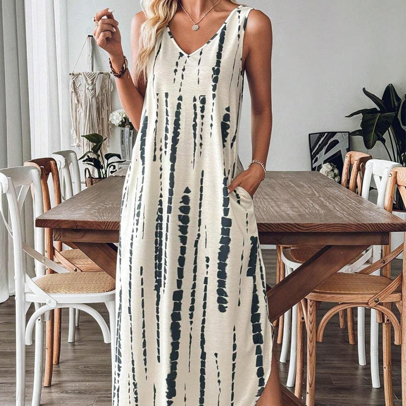👗Une élégante robe longue sans manches pour femme, avec un décolleté en V✨