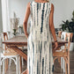 👗Une élégante robe longue sans manches pour femme, avec un décolleté en V✨