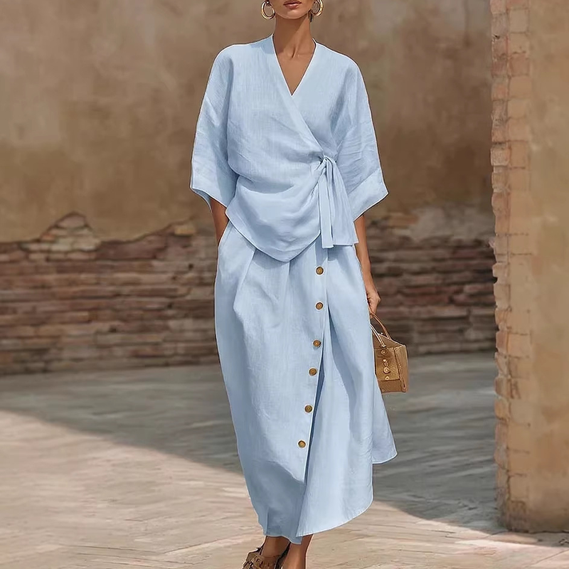 Vêtements décontractés pour femmes : un ensemble deux pièces comprenant un haut et une jupe boutonnée sur le côté, avec des poches.💝