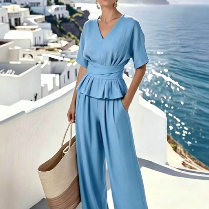 Ensemble femme composé d'un haut à taille croisée et d'un pantalon à jambes larges