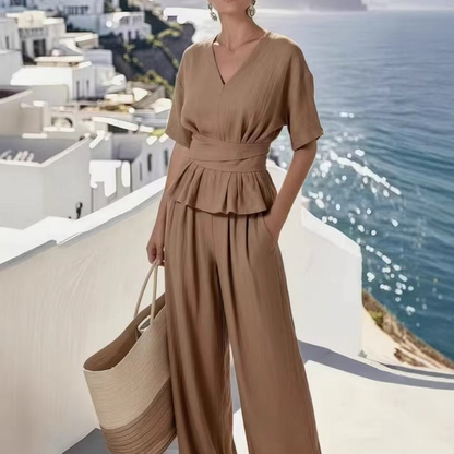 Ensemble femme composé d'un haut à taille croisée et d'un pantalon à jambes larges