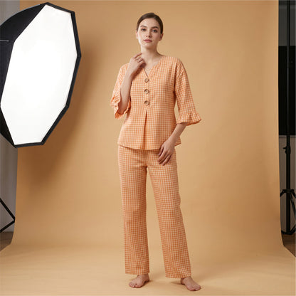 Ensemble femme composé d'un haut à col en V à manches à volants et d'un pantalon, motif à carreaux