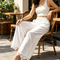 Pantalon pour femme en lin, à jambes larges et bordé de dentelle à l'ourlet