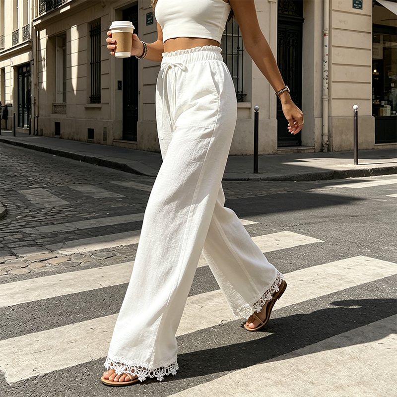 Pantalon pour femme en lin, à jambes larges et bordé de dentelle à l'ourlet