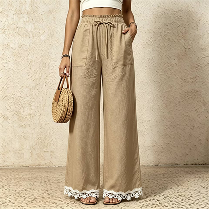 Pantalon pour femme en lin, à jambes larges et bordé de dentelle à l'ourlet