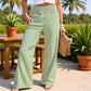 Pantalon pour femme à taille froncée et motif vichy rayé