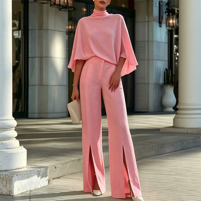 Ensemble élégant pour femme composé d'un haut cape à col montant et d'un pantalon à jambes larges