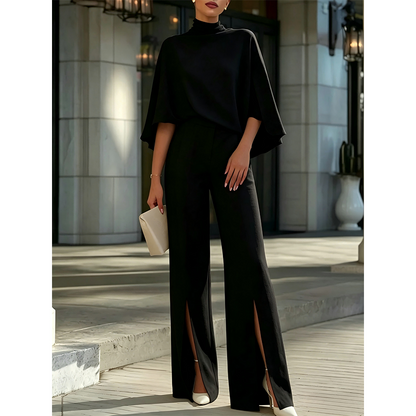 Ensemble élégant pour femme composé d'un haut cape à col montant et d'un pantalon à jambes larges