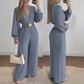 Combinaison pantalon élégante à col V et jambes larges avec ceinture