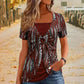 T-shirt femme faux deux pièces à imprimé léopard et anneau en O