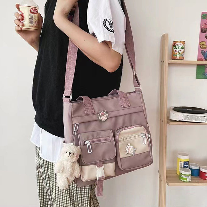 📢📢50% DE RÉDUCTION !! ⏰Joli sac à bandoulière pour adolescentes avec 2 écussons