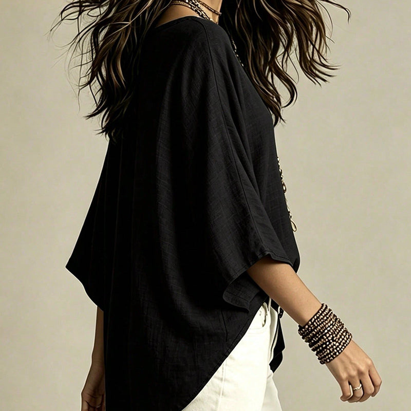 Blouse féminine col V drapé et fluide