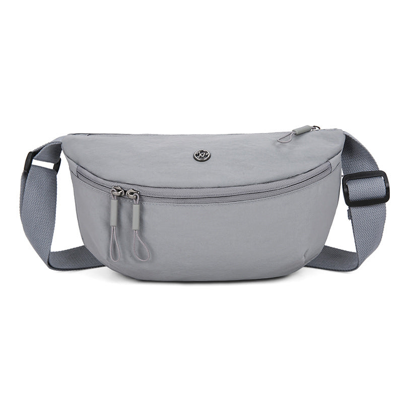 Sac bandoulière minimaliste en forme de demi-lune
