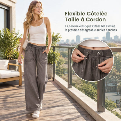 Jean American Vintage taille basse légèrement évasé, avec ceinture élastiquée à cordonnet et poches patteilleuses