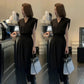 Ensemble deux pièces chic à la française composé d'un haut et d'un pantalon à col en V